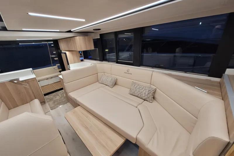 Slide: The Image of Luxurious interior of 2026 Cobra Yachts Seamaster 45 with modern seating and elegant design. - 65