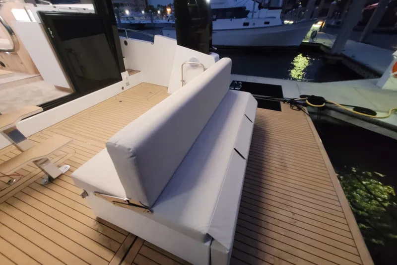 Slide: The Image of Luxury Cobra Yachts Seamaster 45 deck with cushioned seating, 2026 model. - 68