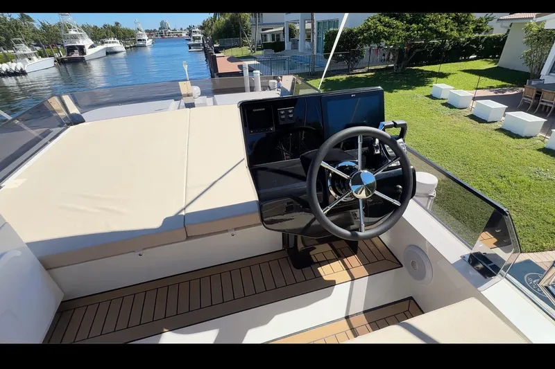 Slide: The Image of Helm of 2026 Cobra Yachts Seamaster 45 with modern steering and navigation controls. - 81