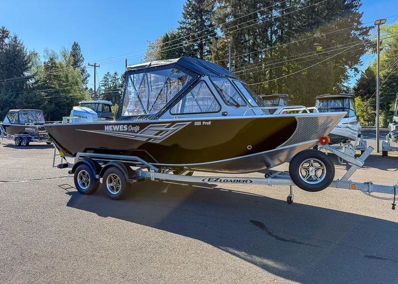 The Image of 2025 Hewescraft 200 ProV boat on trailer outdoors. - 1