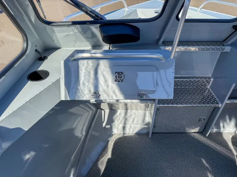 Slide: The Image of Interior of 2025 Hewescraft 200 ProV with storage and window. - 10
