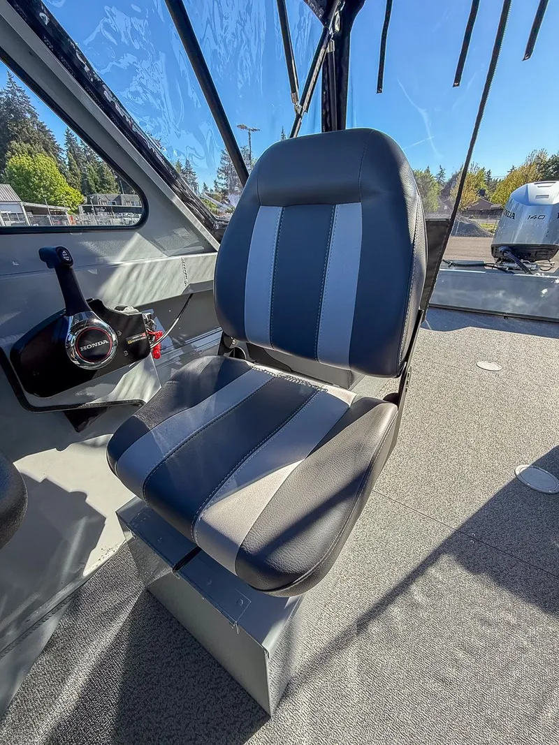 Slide: The Image of Interior of 2025 Hewescraft 200 ProV with seat and controls. - 11