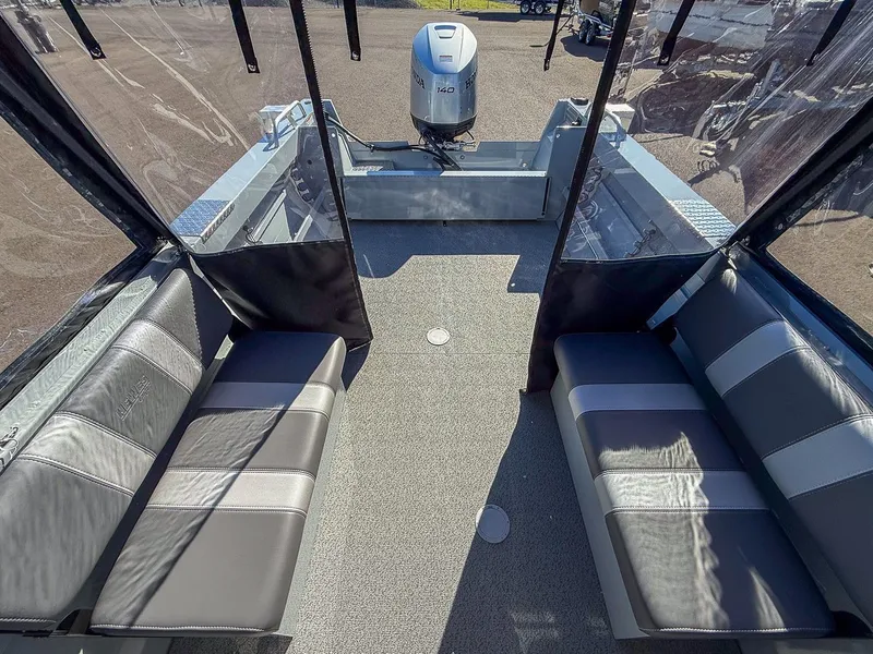 Slide: The Image of Interior of 2025 Hewescraft 200 ProV with seating and motor. - 13