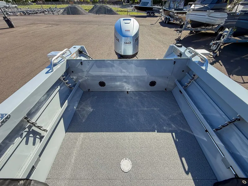 Slide: The Image of Interior view of 2025 Hewescraft 200 ProV with Honda engine. - 15