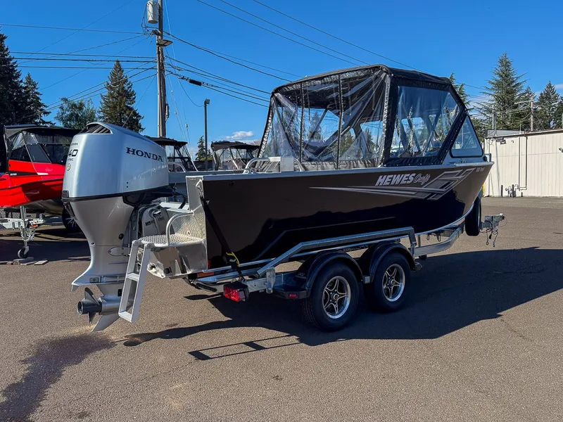Slide: The Image of 2025 Hewescraft 200 ProV boat with Honda engine on trailer. - 3