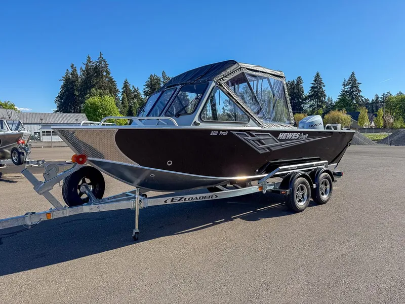 Slide: The Image of 2025 Hewescraft 200 ProV boat on trailer outdoors. - 6