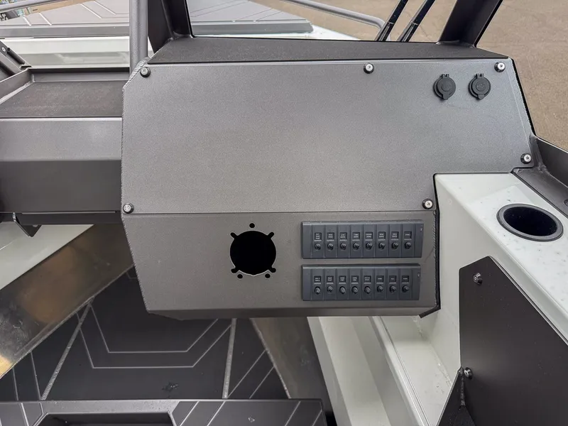 Slide: The Image of Dashboard of 2026 Stabicraft 2050 Treker with switches and sockets. - 11