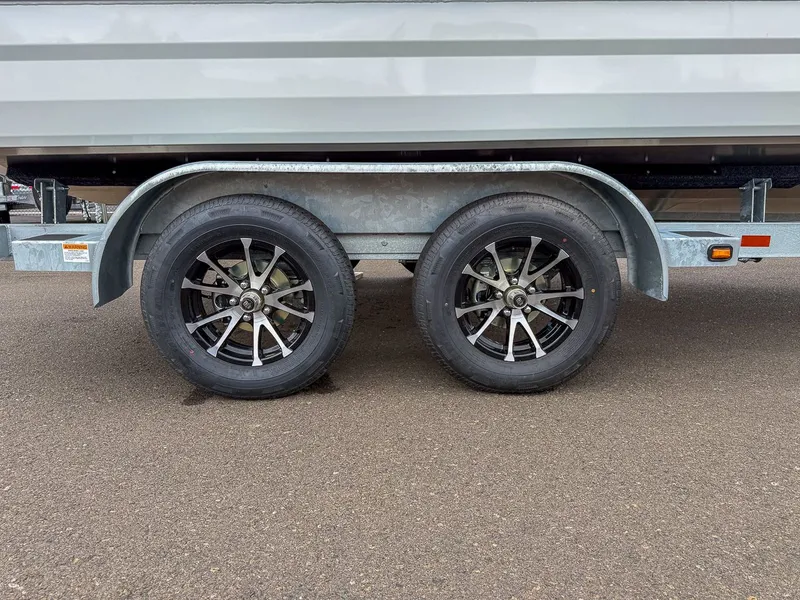 Slide: The Image of Stabicraft 2050 Treker 2026 trailer with dual axle wheels. - 25
