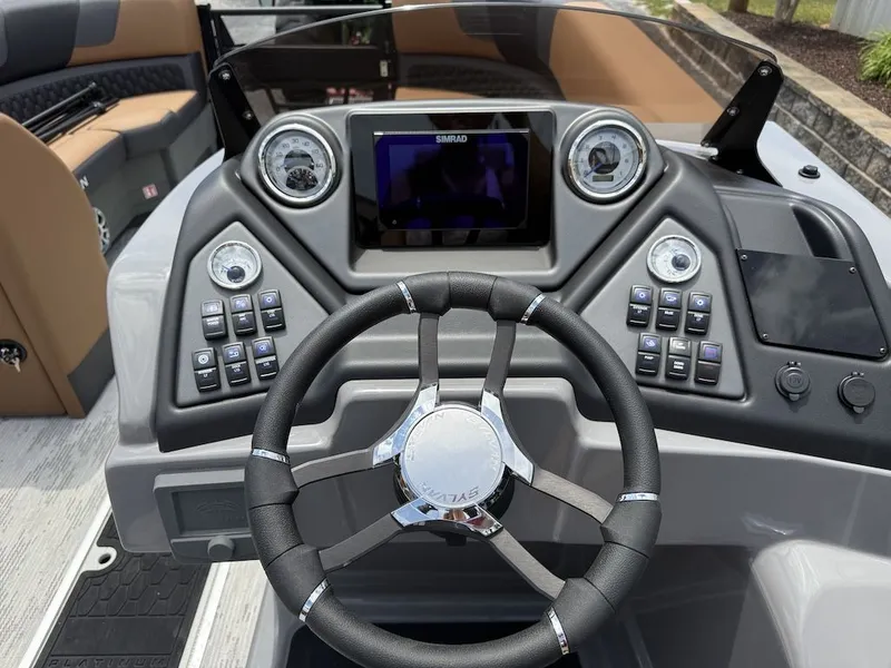 Slide: The Image of 2026 Sylvan L-3 LZ DH helm with steering wheel and controls. - 18