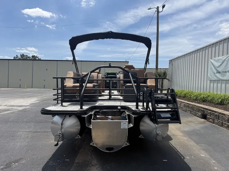 Slide: The Image of 2026 Sylvan L-3 LZ DH pontoon boat in parking lot. - 8