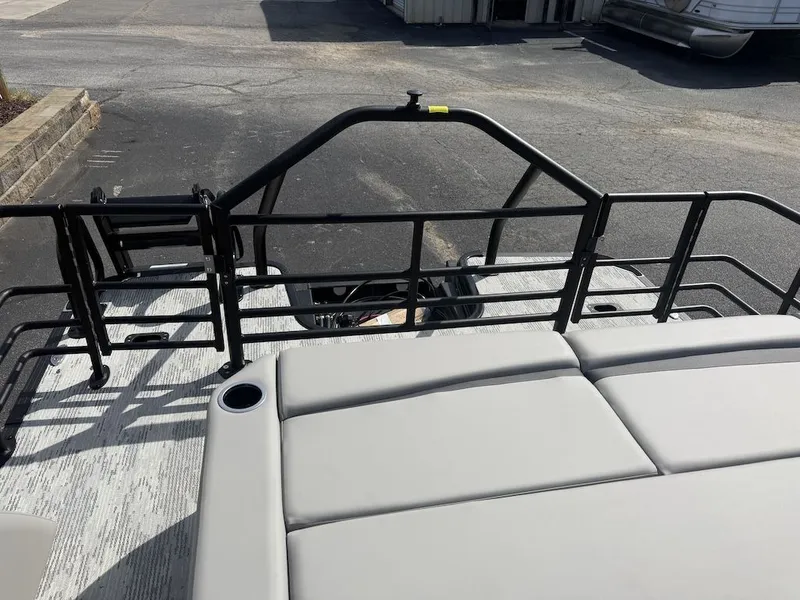 Slide: The Image of 2026 Starcraft SLS 3 Q DH pontoon boat with gray upholstery. - 23