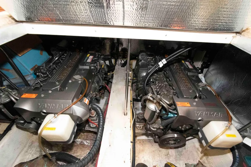 Slide: The Image of Engine room of 2003 Cruisers Yachts 4050 Express with dual Yanmar engines. - 28