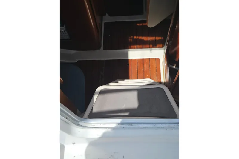 Slide: The Image of Interior cabin of 1997 Beneteau Oceanis Clipper 321 sailboat, featuring cozy sleeping area. - 18