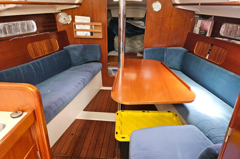 Slide: The Image of Bathroom interior of 1997 Beneteau Oceanis Clipper 321 yacht, featuring toilet and sink. - 31