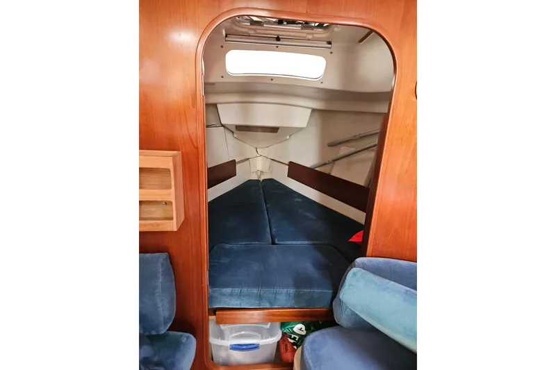Slide: The Image of 1997 Beneteau Oceanis Clipper 321 yacht bathroom with compact design and wooden accents. - 32