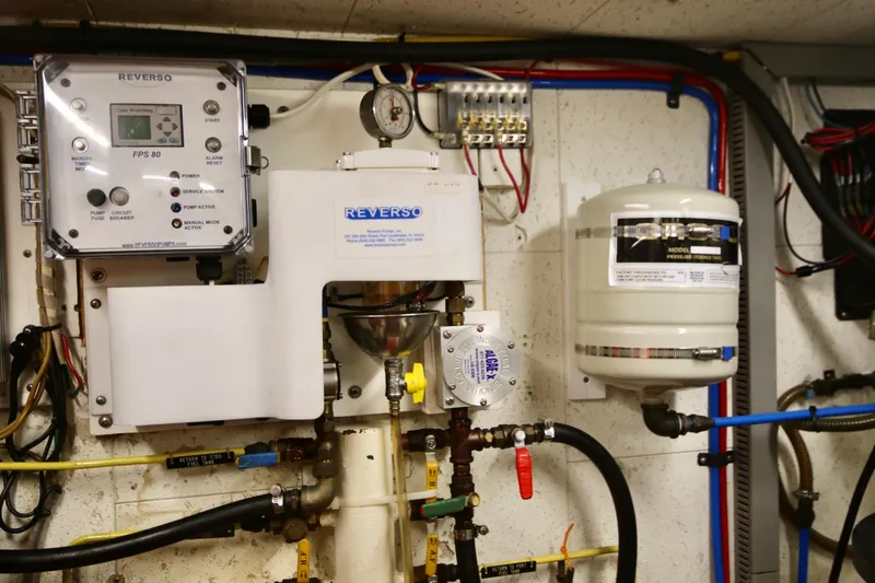 Slide: The Image of Engine room of 1998 DeFever 44 Sundeck Trawler with Reverso fuel polishing system. - 22