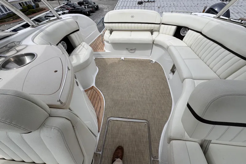 Slide: The Image of Luxurious interior of a 2018 Cobalt R35 boat with white seating and sleek design. - 10