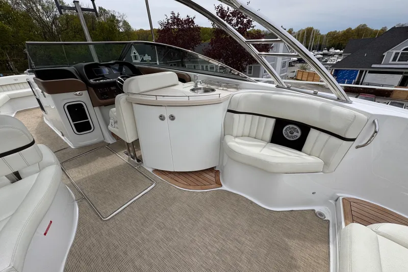 Slide: The Image of Luxurious interior of a 2018 Cobalt R35 boat with plush seating and modern dashboard. - 12