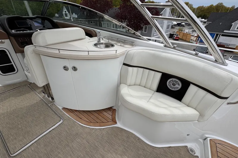 Slide: The Image of Luxurious interior of a 2018 Cobalt R35 boat with seating and sink area. - 18