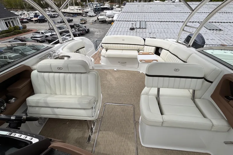 Slide: The Image of Luxurious 2018 Cobalt R35 boat interior with white seating and elegant design. - 26