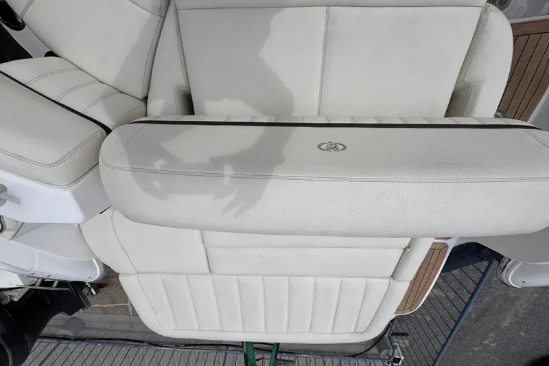 Slide: The Image of White leather seating on a 2018 Cobalt R35 boat, showcasing luxury and comfort. - 32