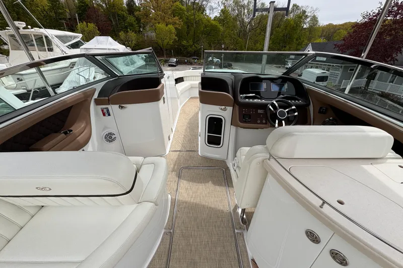 Slide: The Image of Interior of a 2018 Cobalt R35 boat with luxurious seating and modern dashboard. - 8