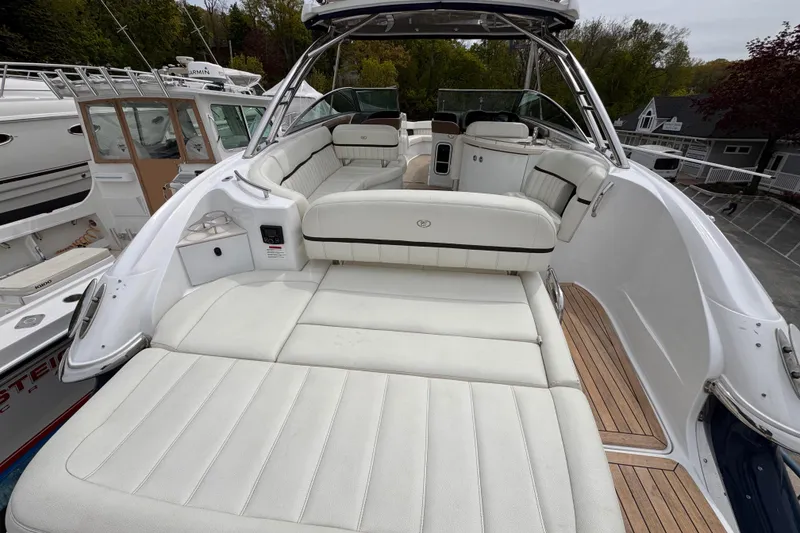 Slide: The Image of Luxurious 2018 Cobalt R35 boat with spacious white seating and teak flooring. - 9