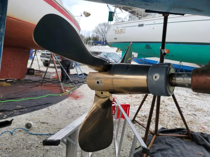 Slide: The Image of Propeller of a 2002 Hunter 356 sailboat in a dry dock. - 14