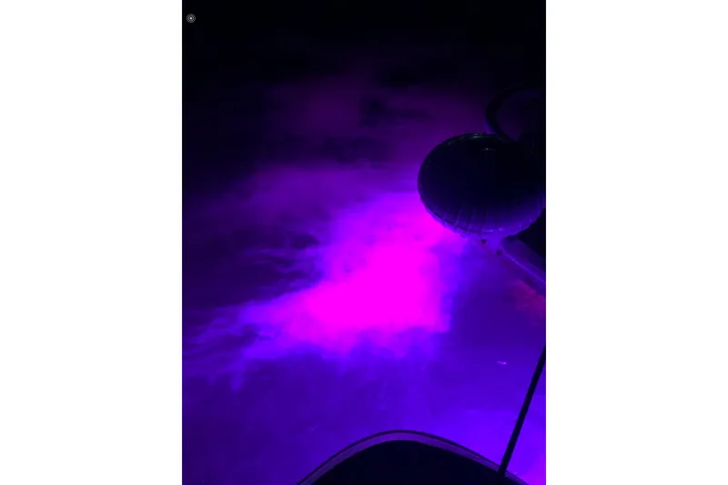 Slide: The Image of Purple underwater lights on a 2006 Sea Ray 300 Sundancer at night. - 17