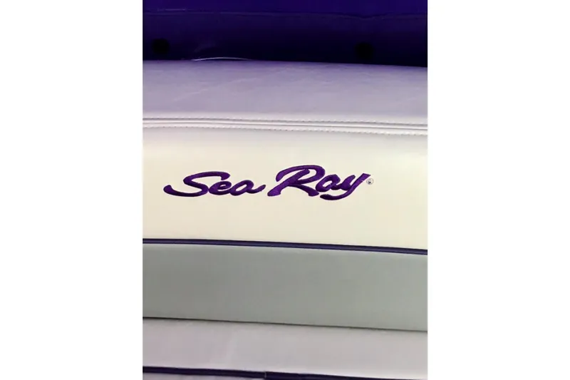 Slide: The Image of Sea Ray 300 Sundancer 2006 logo on boat upholstery. - 4