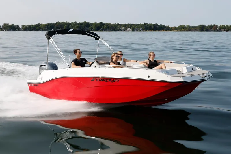 The Image of Manufacturer Provided Image: 2026 Starcraft SVX 191 OB boat cruising on a lake with passengers enjoying the ride. - 0