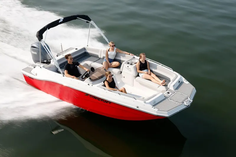 Slide: The Image of Manufacturer Provided Image: 2026 Starcraft SVX 191 OB boat cruising with passengers on a sunny day. - 2