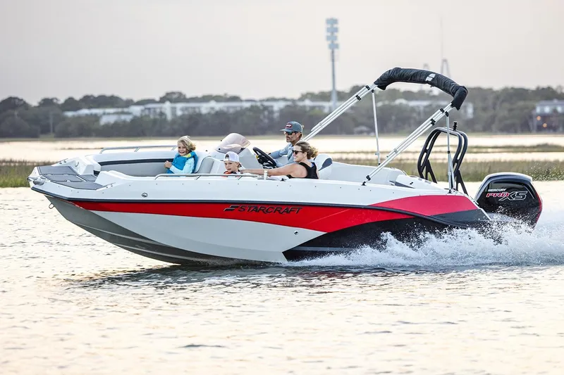 Slide: The Image of Manufacturer Provided Image: 2026 Starcraft SVX 191 OB boat cruising on water with passengers enjoying the ride. - 4