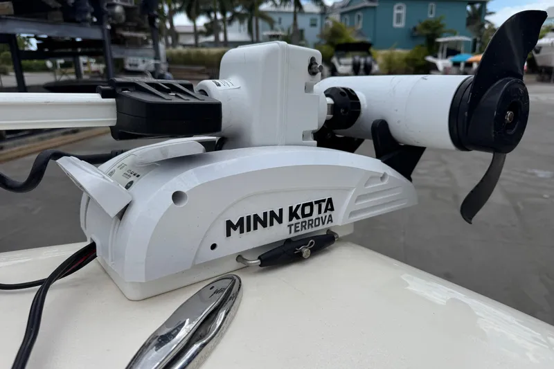 Slide: The Image of Minn Kota Terrova motor on 2022 Scout 195 Sport Dorado boat, dockside view. - 8