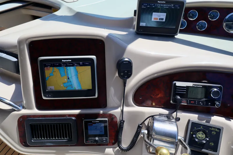 Slide: The Image of Sea Ray Sundancer 460 dashboard with navigation system. - 30