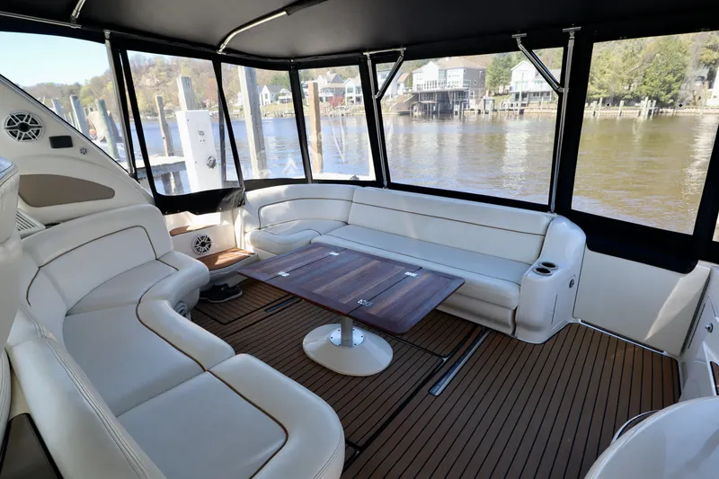 Slide: The Image of Interior of a 1999 Sea Ray Sundancer 460 yacht with leather seating. - 35