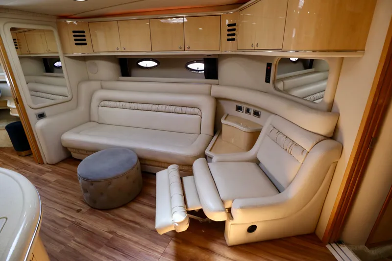 Slide: The Image of Interior of 1999 Sea Ray Sundancer 460 yacht with beige leather sofas. - 23