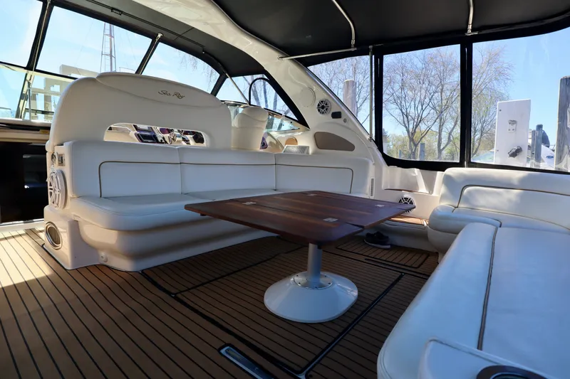 Slide: The Image of Interior of 1999 Sea Ray Sundancer 460 yacht with luxurious leather seating. - 38
