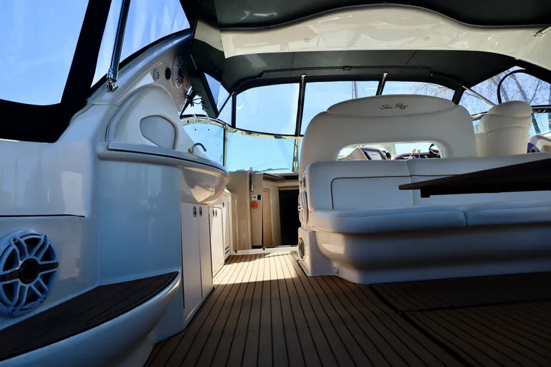 Slide: The Image of Interior of a 1999 Sea Ray Sundancer 460 yacht with elegant furnishings. - 39