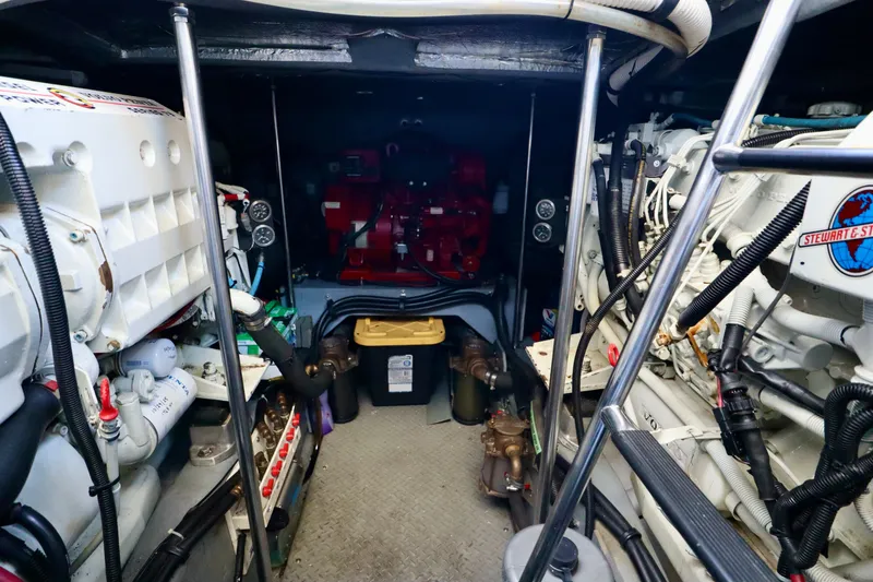 Slide: The Image of Engine room of 1999 Sea Ray Sundancer 460 with technical details. - 42