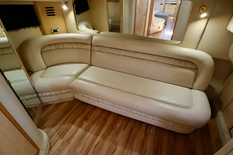Slide: The Image of Interior of 1999 Sea Ray Sundancer 460 yacht with beige leather sofa. - 9