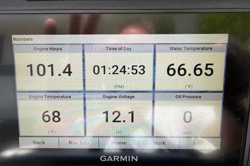 Slide: The Image of Garmin display showing engine metrics for 2022 Crownline 280 SS boat. - 16