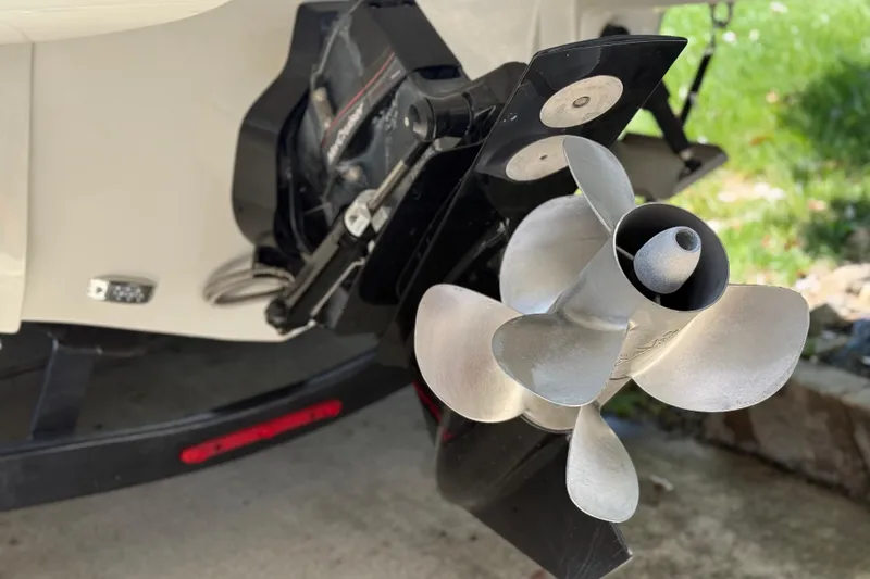 Slide: The Image of Close-up of a 2022 Crownline 280 SS boat propeller and stern drive. - 17