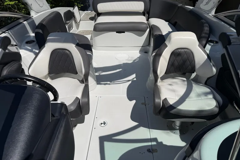Slide: The Image of 2022 Crownline 280 SS boat interior with luxurious seating and modern design. - 19