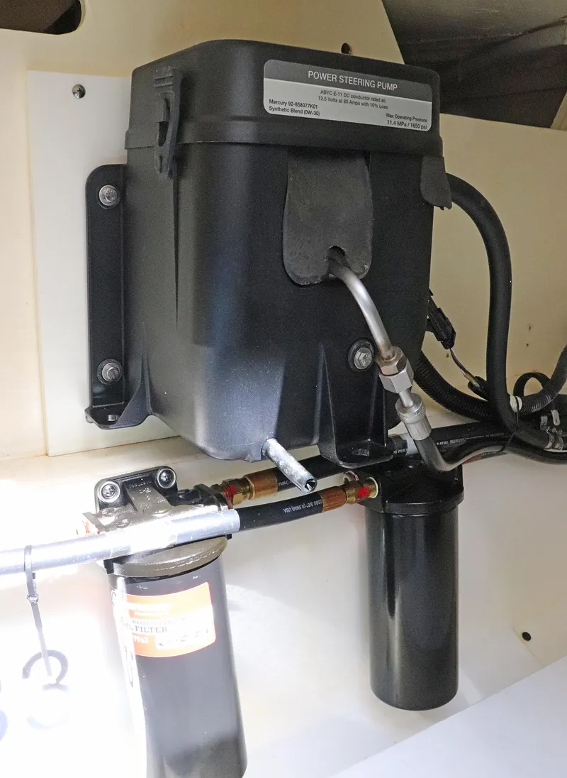 Slide: The Image of 2021 Tiara Sport 34 LX power steering pump and filter system. - 29