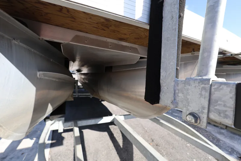Slide: The Image of Underneath view of a 2020 Bennington SX 22 SSRX pontoon boat on a trailer. - 10
