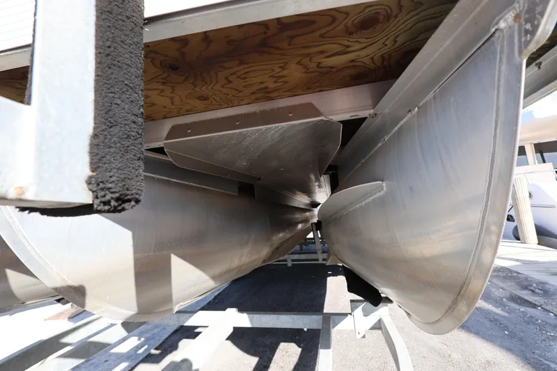 Slide: The Image of Underneath view of a 2020 Bennington SX 22 SSRX pontoon boat on a trailer. - 11
