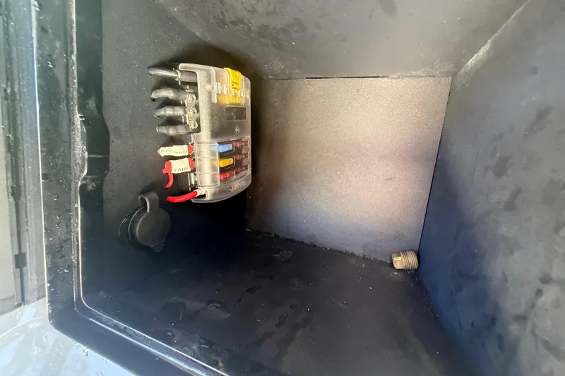 Slide: The Image of Electrical fuse box inside a 1984 Chris-Craft 213 Scorpion boat compartment. - 24