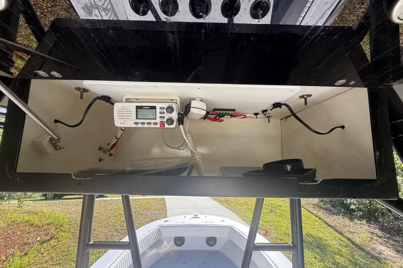 Slide: The Image of 1984 Chris-Craft 213 Scorpion boat electronics compartment with radio and wiring. - 30