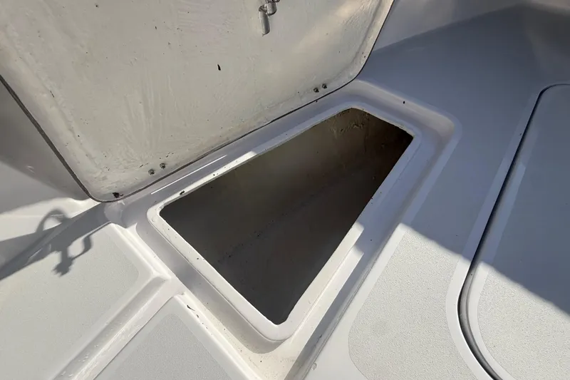 Slide: The Image of Open storage compartment on 1984 Chris-Craft 213 Scorpion boat deck. - 37